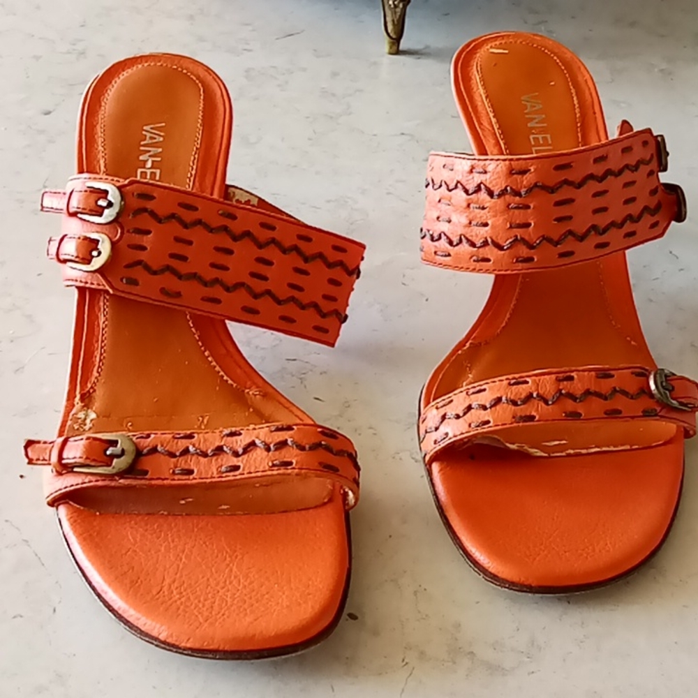 Very pretty summer or fall sandals. Warm orange leather with brown trim